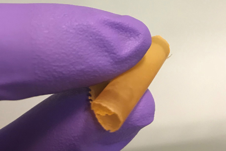 UC Berkeley chemists synthesized a flexible polymer membrane incorporating nanoparticles called “porous aromatic frameworks.” The membrane selectively absorbs nearly 100% of metals such as mercury, copper, or iron during desalination, more efficiently producing clean, safe water. The membrane can incorporate a single type of tuned nanoparticle if the metal is to be recovered – or several different types, each tuned to absorb a different metal or ionic compound if multiple contaminants need to be removed in one step. (Credit: Adam Uliana/UC Berkeley)